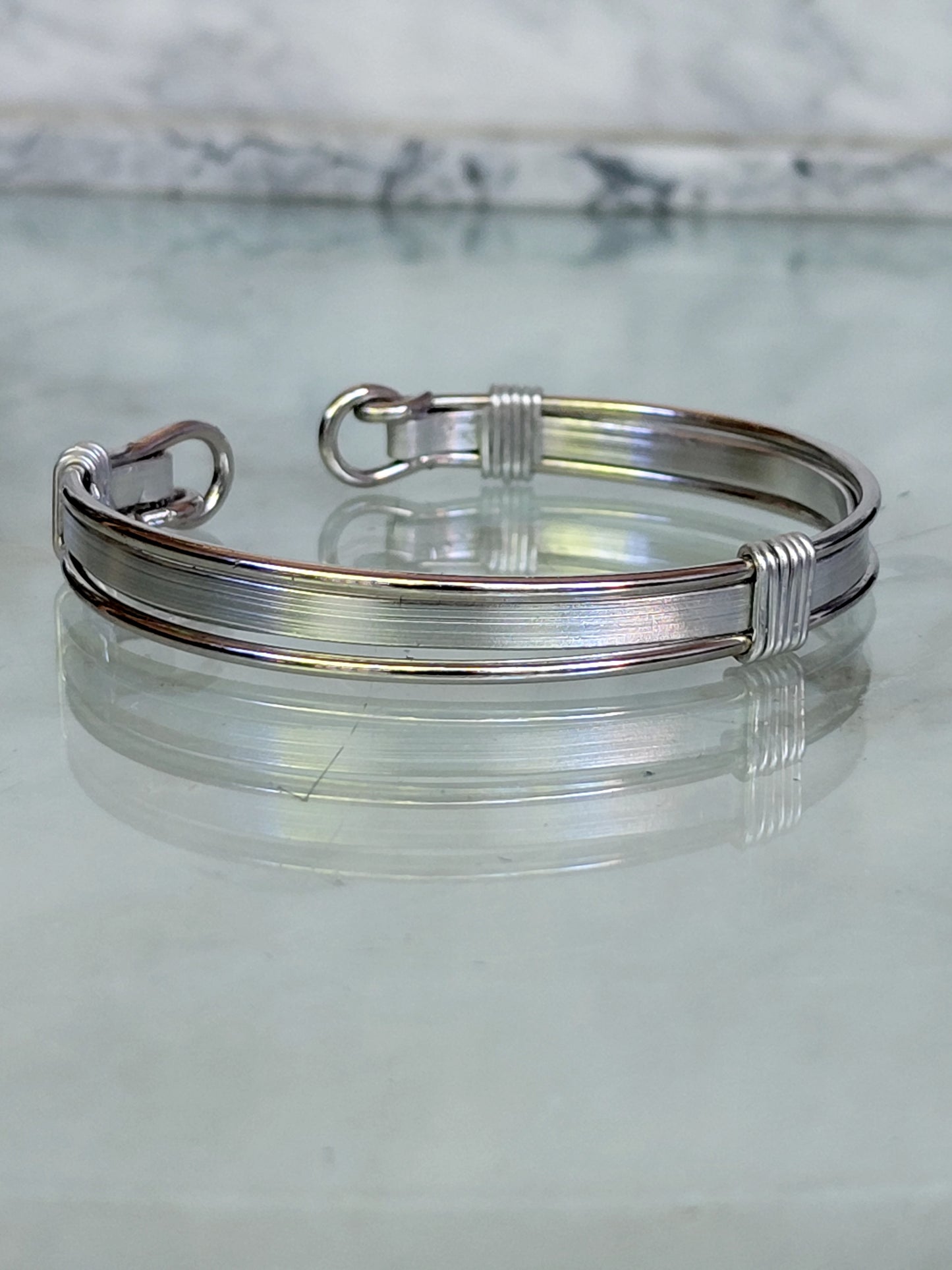 Silver Toned Open Tension Cuff