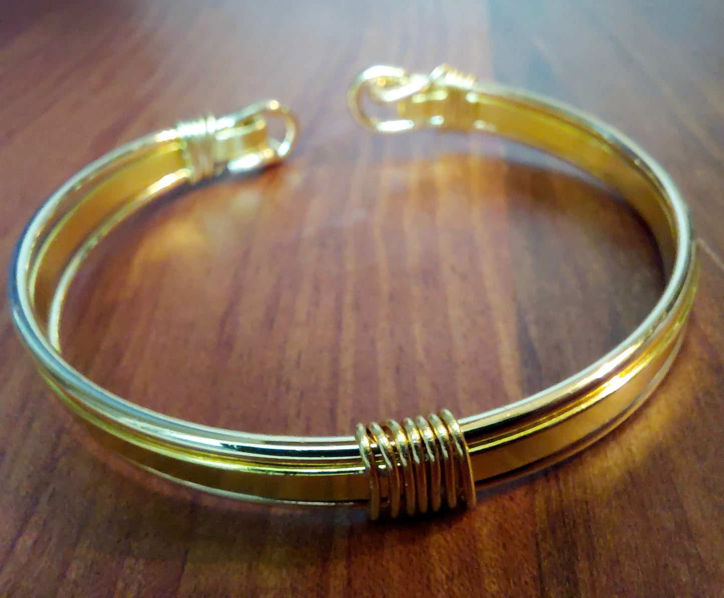 Gold Toned Open Tension Cuff